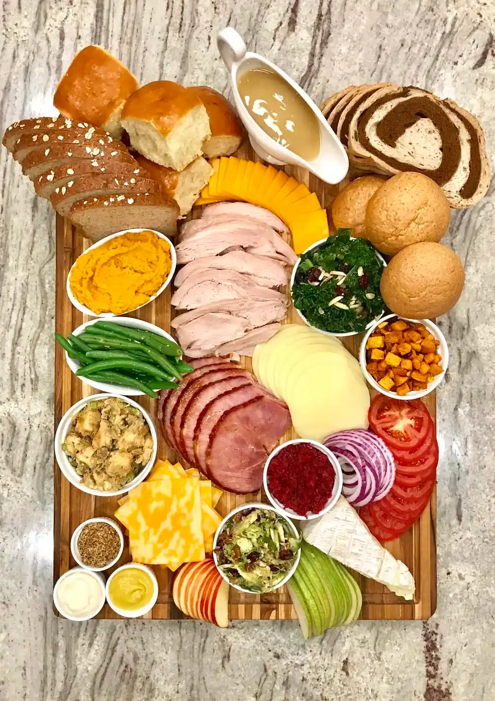 Halaal grazing platter with cold meats, cheeses, breads, fruit and salads