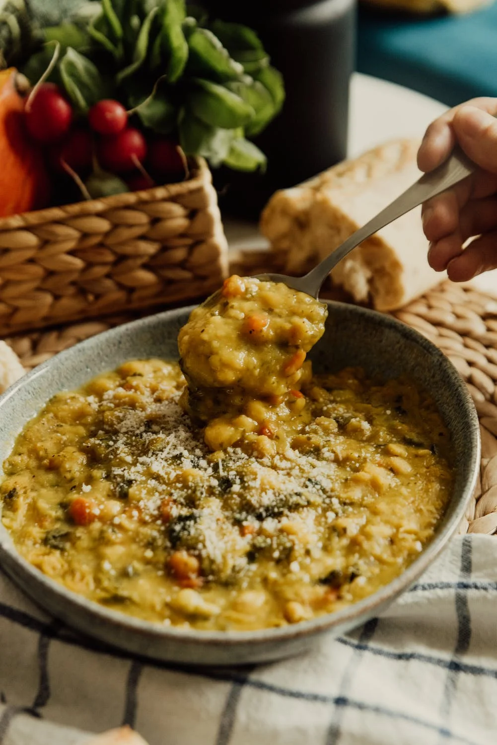 Hearty vegetable and lentil soup served with bread